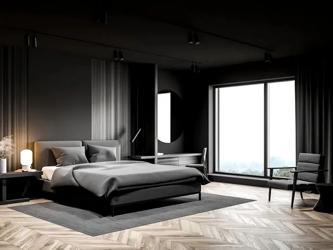 Hardwood flooring installed in herringbone pattern in modern bedroom